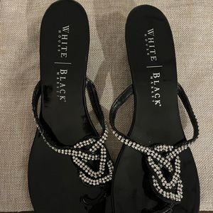 Silver bling size 9 flip flops with a short heel from White House Black Market